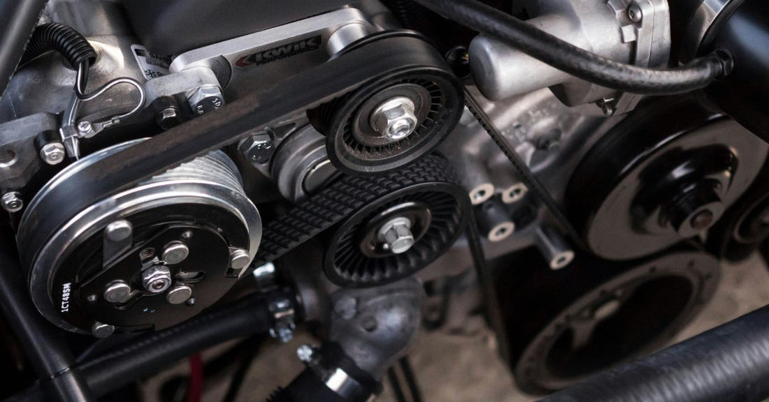 Engine pulley wheels and belts